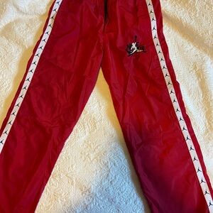 Jordan Kids Red Track Pants with Side Jumpman Tape